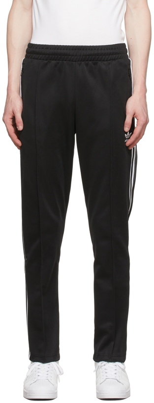 Photo: adidas Originals Black Adicolor Classics 3-Stripes Track Pants