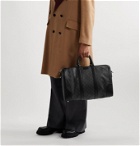 Gucci - Leather-Trimmed Monogrammed Coated-Canvas Holdall - Black