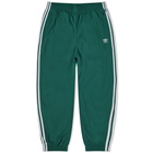 Adidas Men's Woven Firebird Track Pant in Collegiate Green