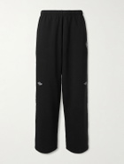 Balenciaga - Wide-Leg Logo-Print Appliquéd Cotton-Jersey Sweatpants - Black