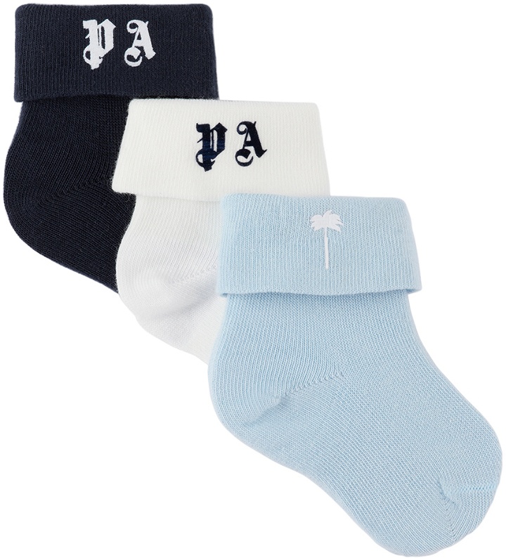 Photo: Palm Angels Baby Three-Pack Blue & White Logo Socks