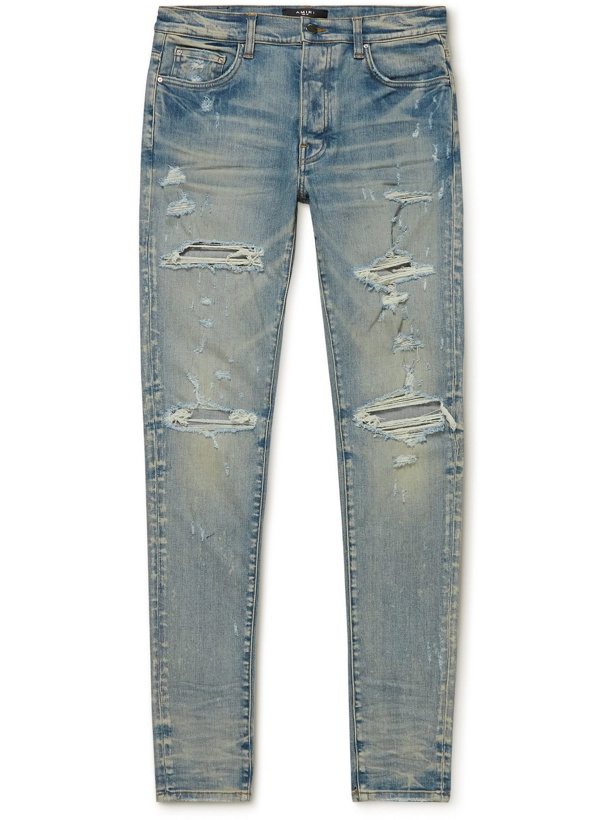 Photo: AMIRI - Thrasher Plus Skinny-Fit Distressed Washed Jeans - Blue