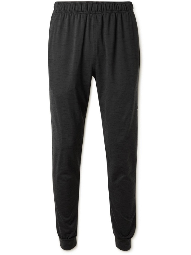Photo: NIKE TRAINING - Tapered Mélange Dri-FIT Stretch-Jersey Yoga Sweatpants - Black