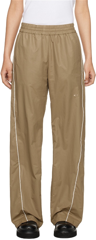 Photo: Commission Beige Twisted Track Pants