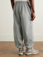 Nike - Solo Swoosh Tapered Logo-Embroidered Cotton-Blend Jersey Sweatpants - Gray