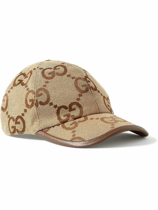 Photo: GUCCI - Leather-Trimmed Monogrammed Canvas Baseball Cap - Brown