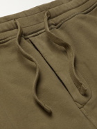 Stone Island - Tapered Logo-Appliquéd Garment-Dyed Fleece-Back Cotton-Jersey Sweatpants - Green