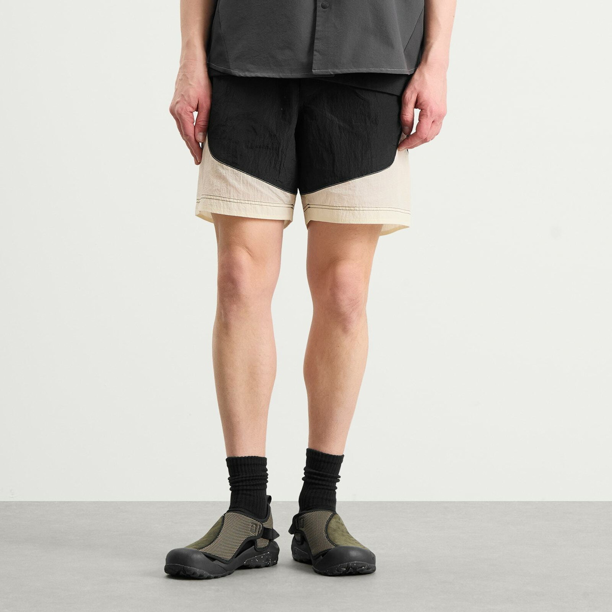 and wander Men's x ROA Ripstop Wind Shorts in Off White