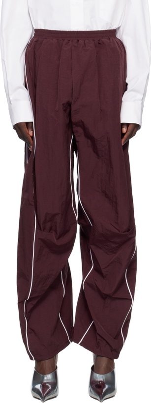 Photo: Pushbutton Red Piping Detail Tucked Track Pants
