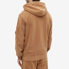 C.P. Company Men's Garment Dyed Arm Lens Popover Hoody in Cumin