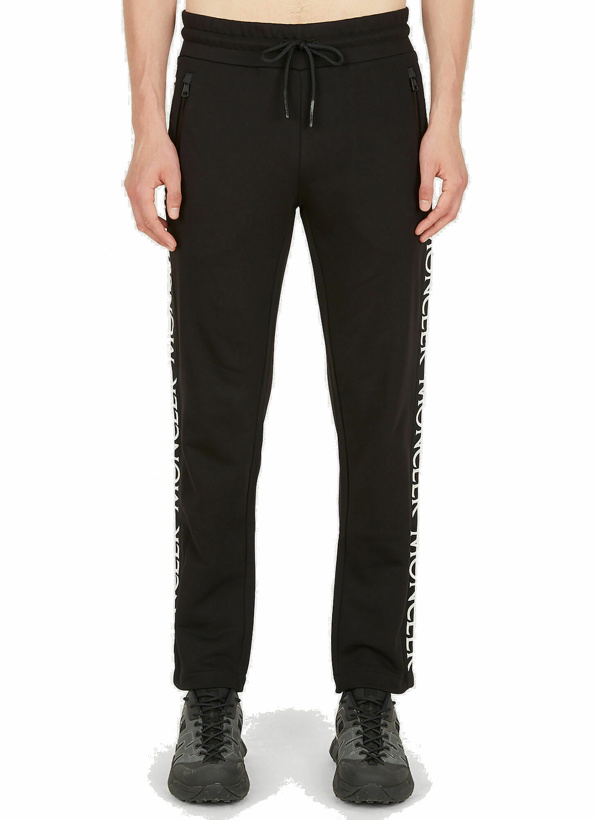 Photo: Logo Embroidered Track Pants in Black