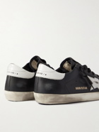 Golden Goose - Superstar Distressed Leather Sneakers - Black