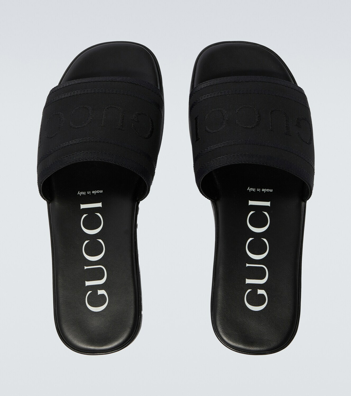 Gucci Logo canvas and leather slides