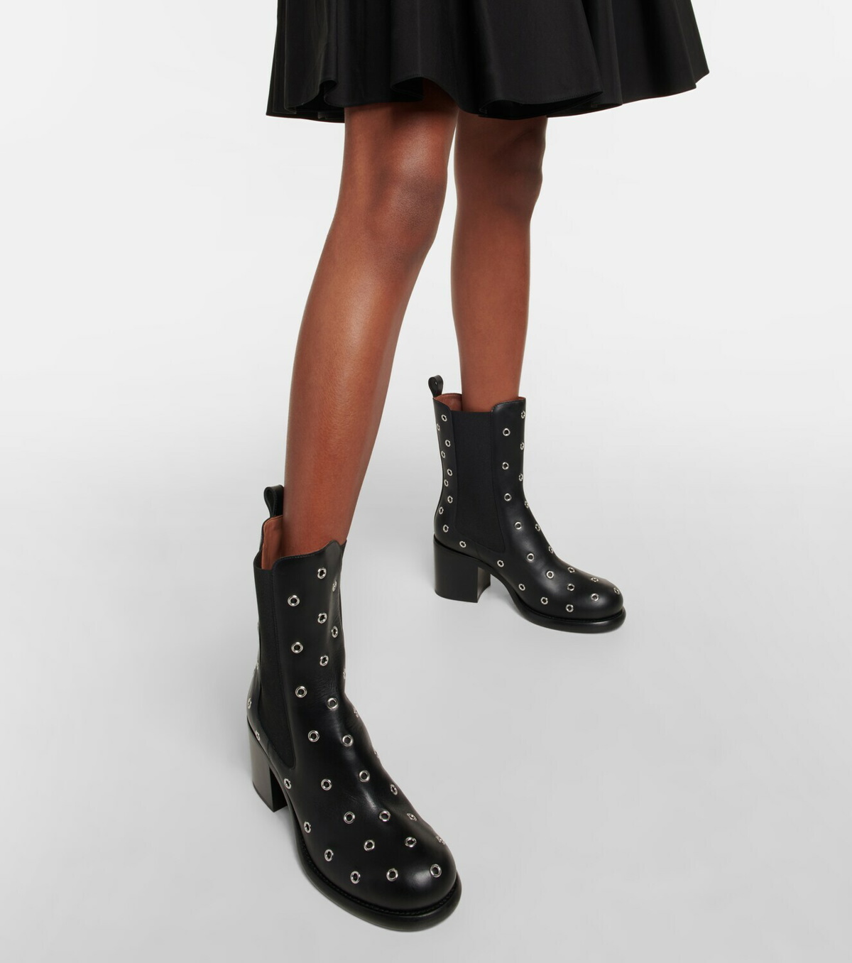 Alaïa Eyelet-embellished leather boots ALAÏA
