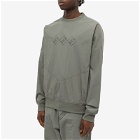 The Trilogy Tapes Men's Tech Sports Crew Sweat in Charcoal