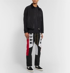 Rhude - Color-Block Logo-Appliquéd Shell Trousers - Black