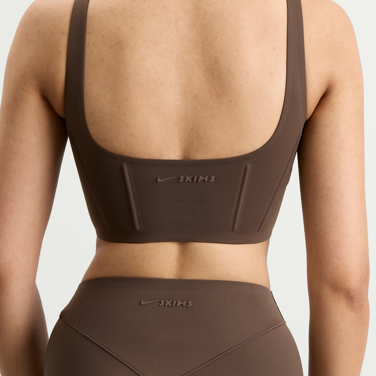 Nike Women's x SKIMS Matte Corset Longline Bra in Dark Sepia