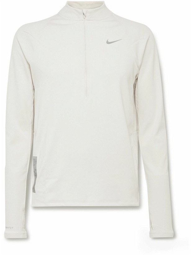 Photo: Nike Running - Run Division Element Striped Therma-FIT Half-Zip Top - White