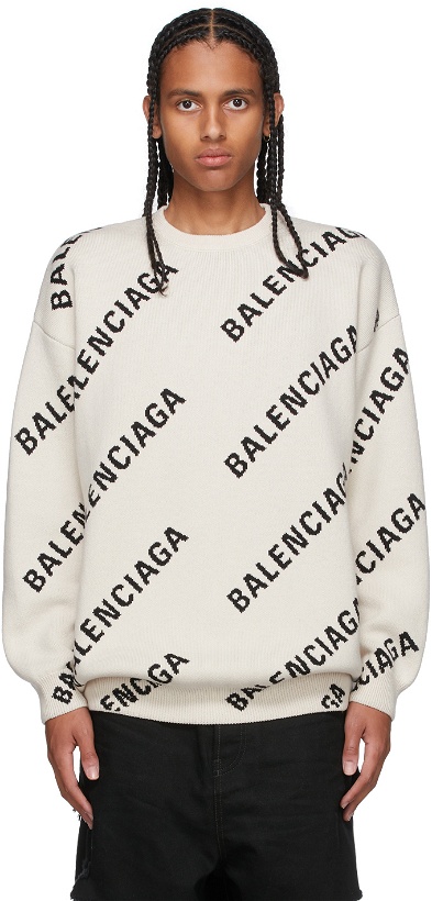 Photo: Balenciaga Off-White & Black All Over Logo Sweater
