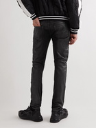 Balmain - Slim-Fit Distressed Coated Jeans - Black