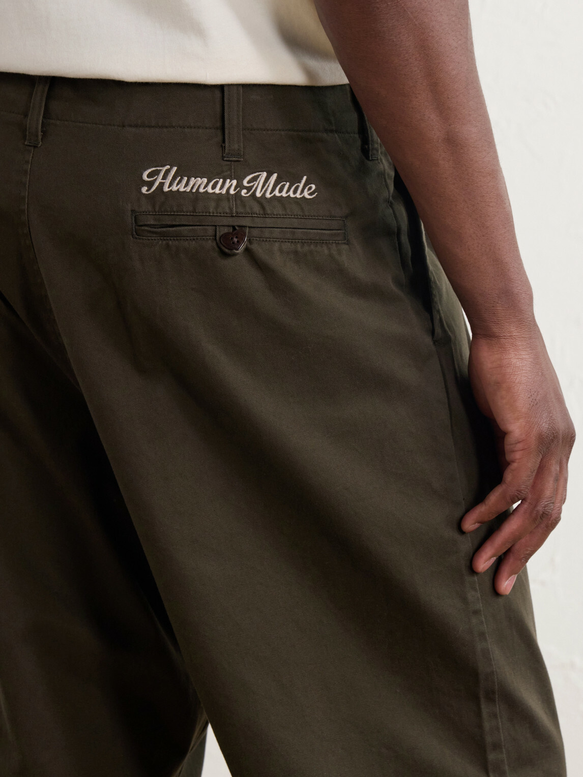 Human Made - Tapered Logo-Embroidered Pleated Cotton-Twill Trousers - Green