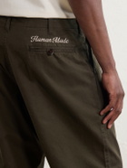 Human Made - Tapered Logo-Embroidered Pleated Cotton-Twill Trousers - Green