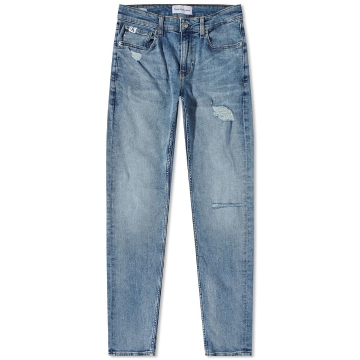 Photo: Calvin Klein Distressed Medium Wash Slim Taper  Jean