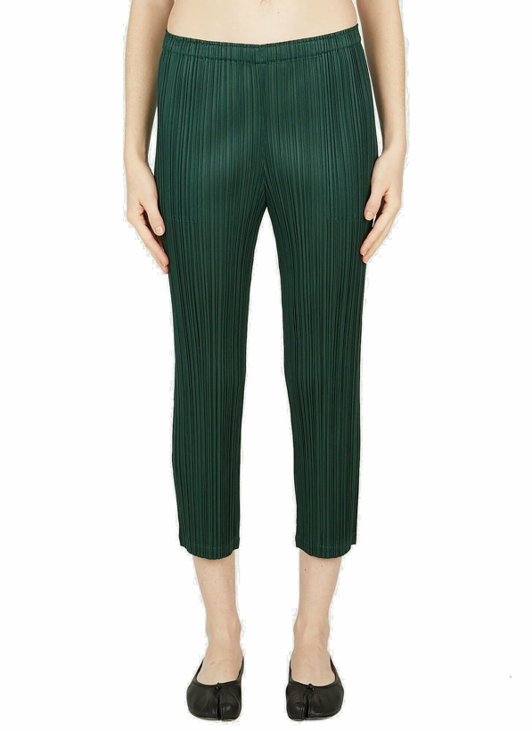 Photo: Pleats Please Issey Miyake - Cropped Pleated Pants in Green