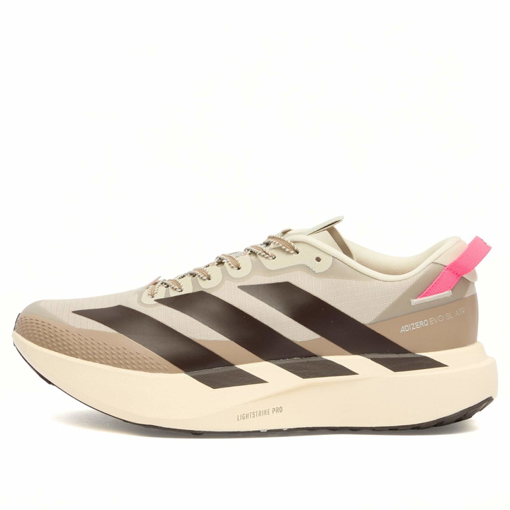 Photo: Adidas Running Men's adidas Adizero Evo Sl Atr Sneaker in Wonder White/Aurora Coffee/Lucid Pink