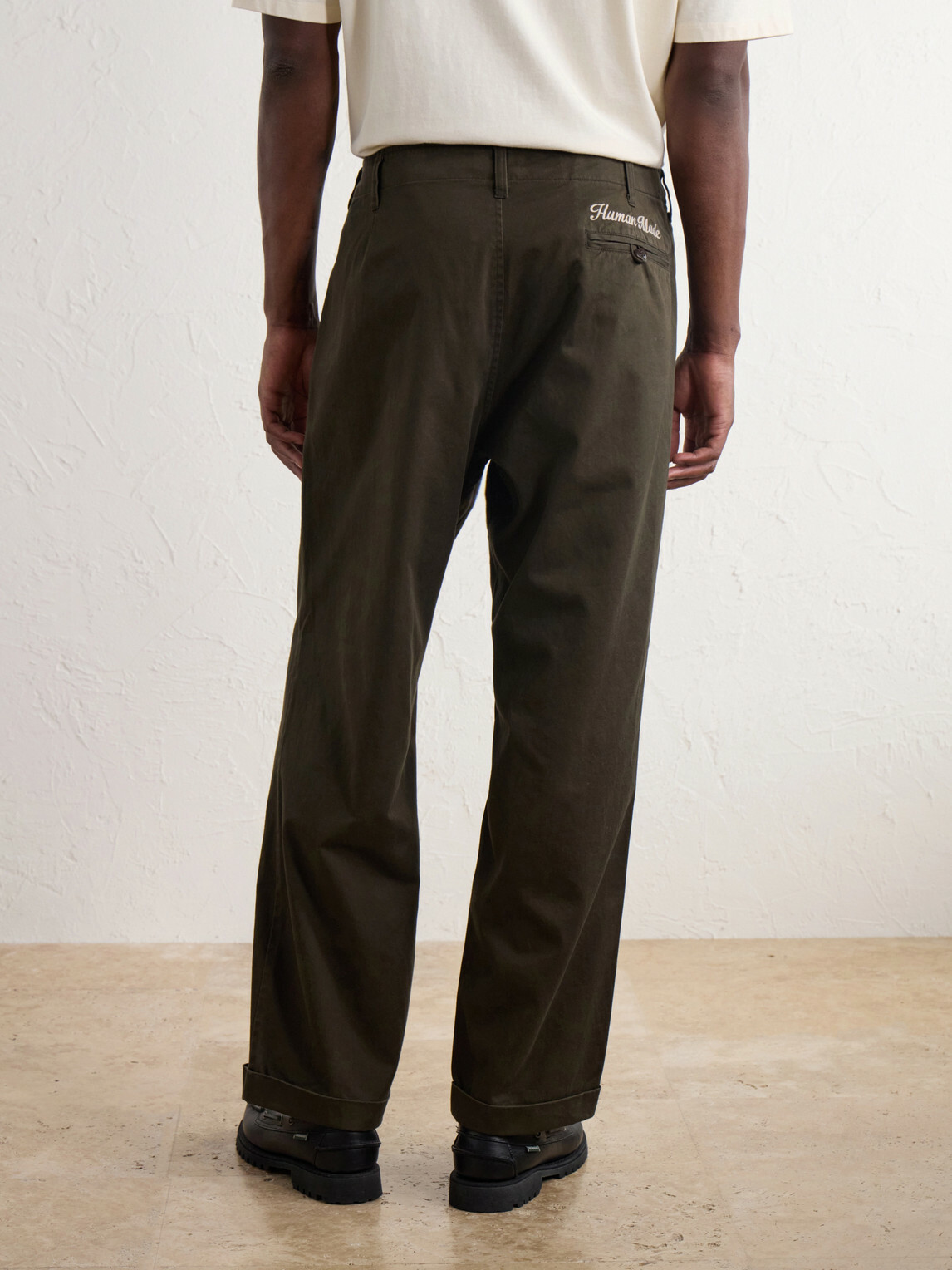 Human Made - Tapered Logo-Embroidered Pleated Cotton-Twill Trousers - Green