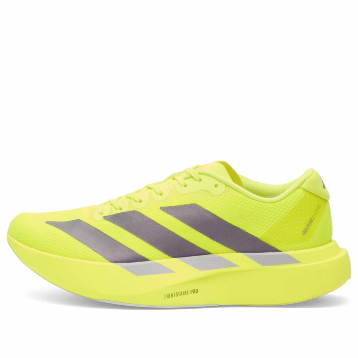 Photo: Adidas Running Women's Adidas Adizero Evo SL Woven Sneaker in Solar Yellow/Aurora Plum/Powder Plum