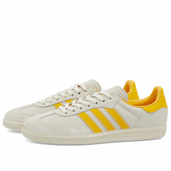 Photo: Adidas x Humanrace Samba Sneakers in Bold Gold/Alumina