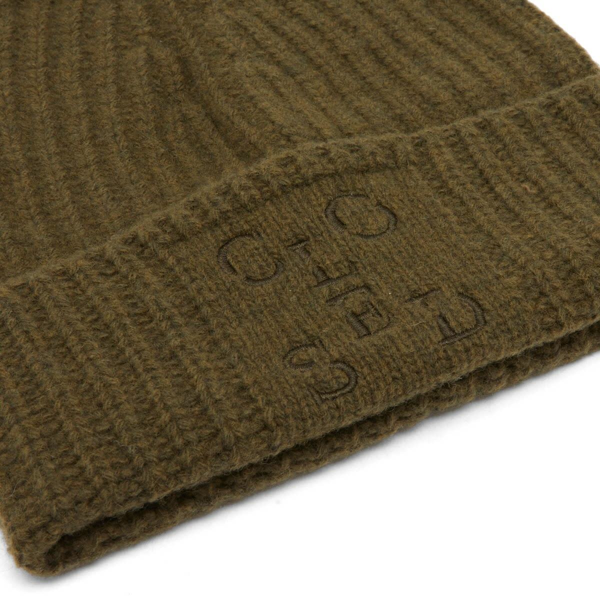 Closed Women's knitted hat in Clover Green 
