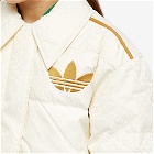 Adidas Women's Adicolor 70s Monogram Puffer Jacket in Cream White