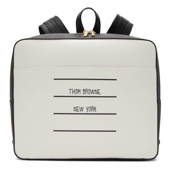 Photo: Thom Browne Black and White Paper Label Zip-Top Book Backpack