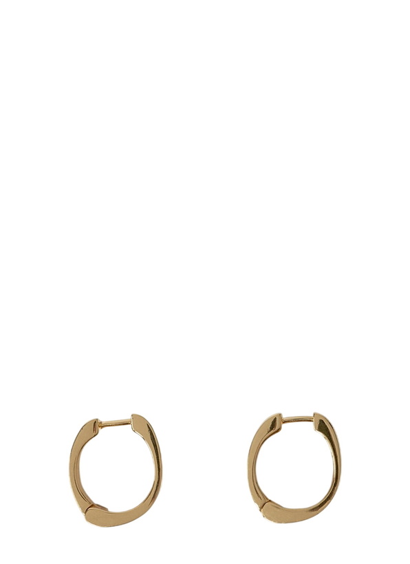 Photo: TOTEME Signature Hoop Earrings