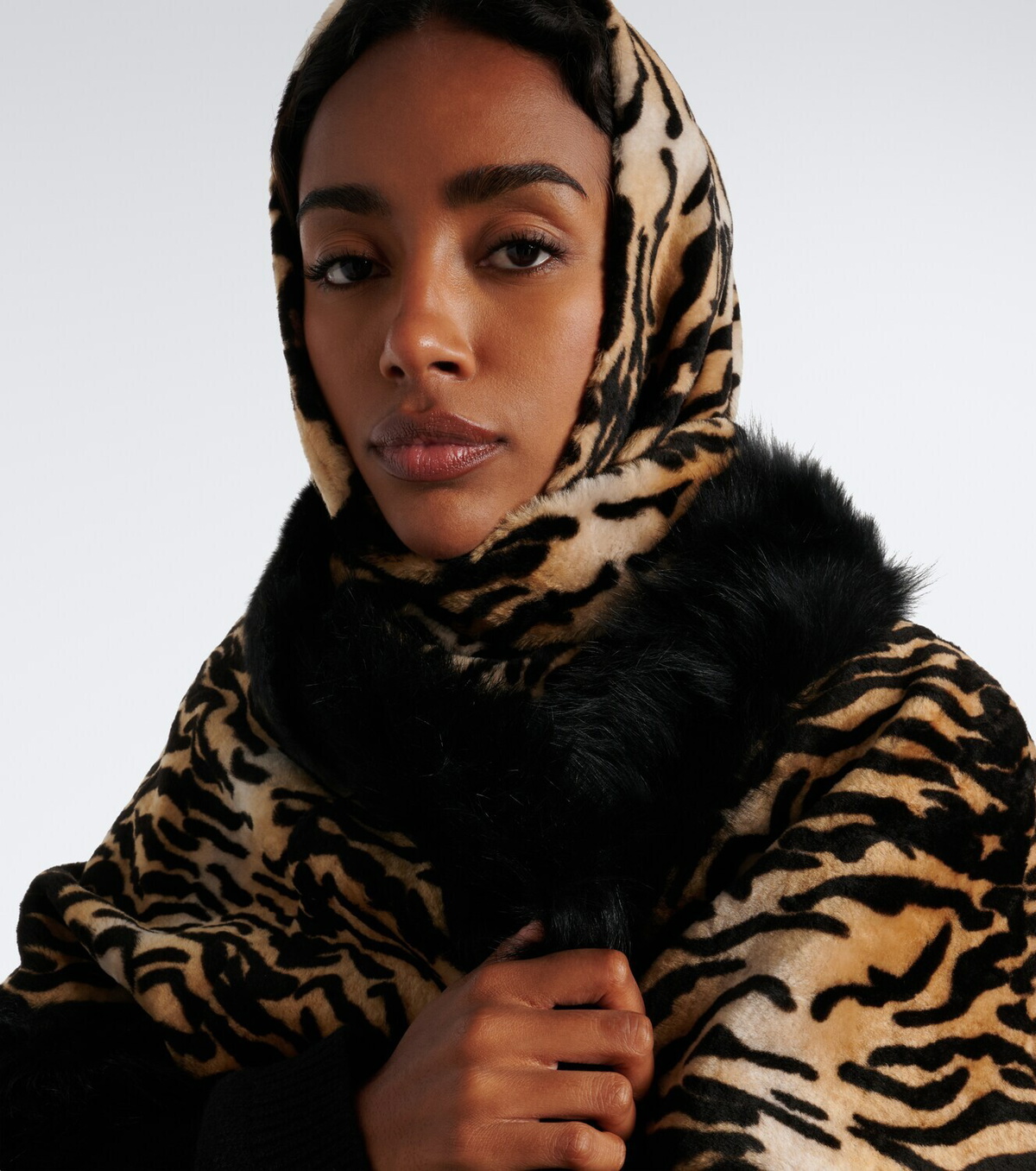 Nour Hammour Printed leather and shearling hood
