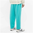 Nike Men's Solo Swoosh Heavyweight Pant in Washed Teal/White