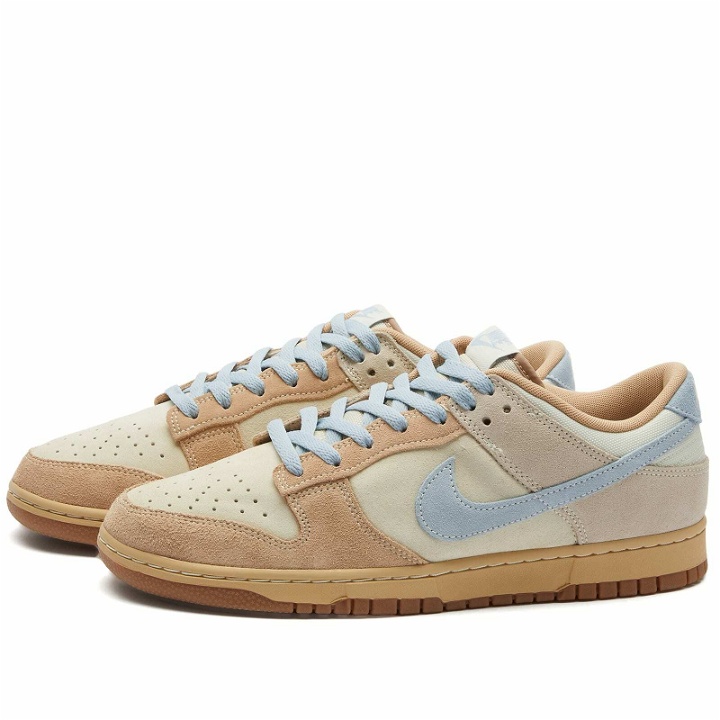 Photo: Nike Men's Dunk Low Sneakers in Coconut Milk/Armory Blue/Brown