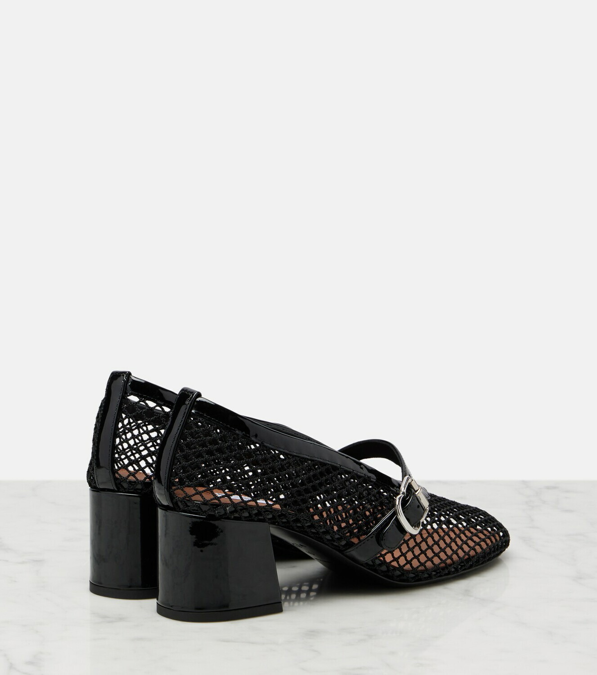 Alaïa Fishnet leather-trimmed Mary Jane pumps