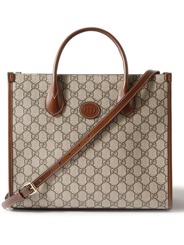 Photo: GUCCI - Leather-Trimmed Monogrammed Coated-Canvas Tote Bag