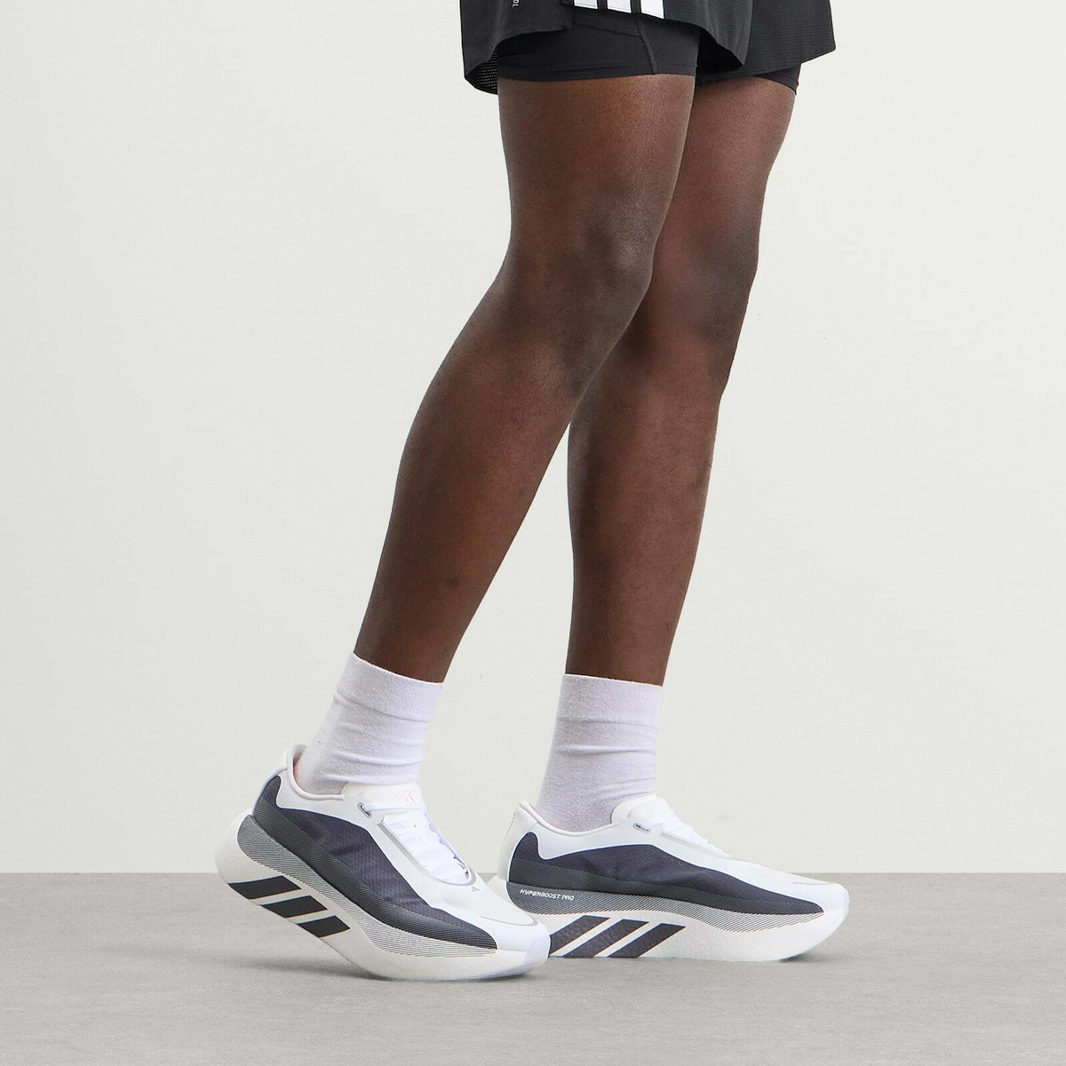 Adidas Men's Hyperboost Edge Sneaker in Ftwr White/Aurora Onix/Solar Turbo