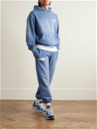 Y,IWO - Hardwear Logo-Print Distressed Cotton-Jersey Sweatpants - Blue