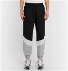 Vetements - Tapered Panelled Coated-Cotton Sweatpants - Black