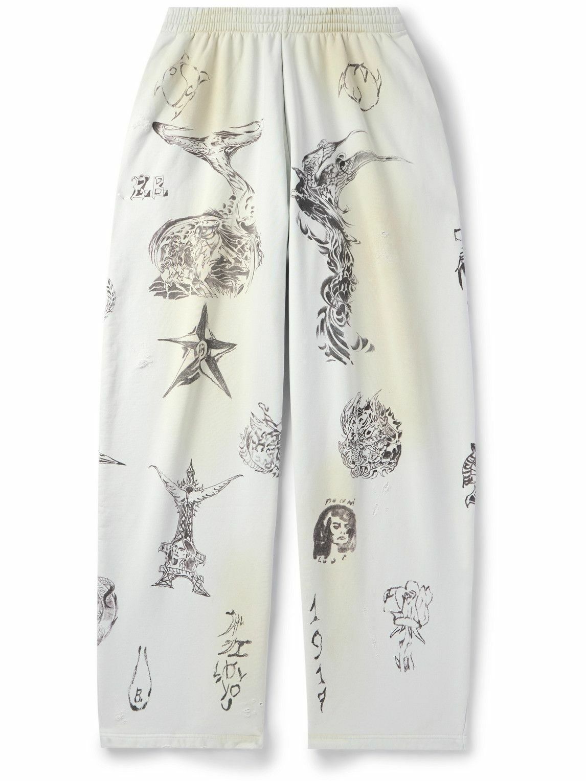 Photo: Balenciaga - Wide-Leg Printed Distressed Cotton-Jersey Sweatpants - White