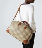 Gucci GG Canvas Medium leather-trimmed duffel bag