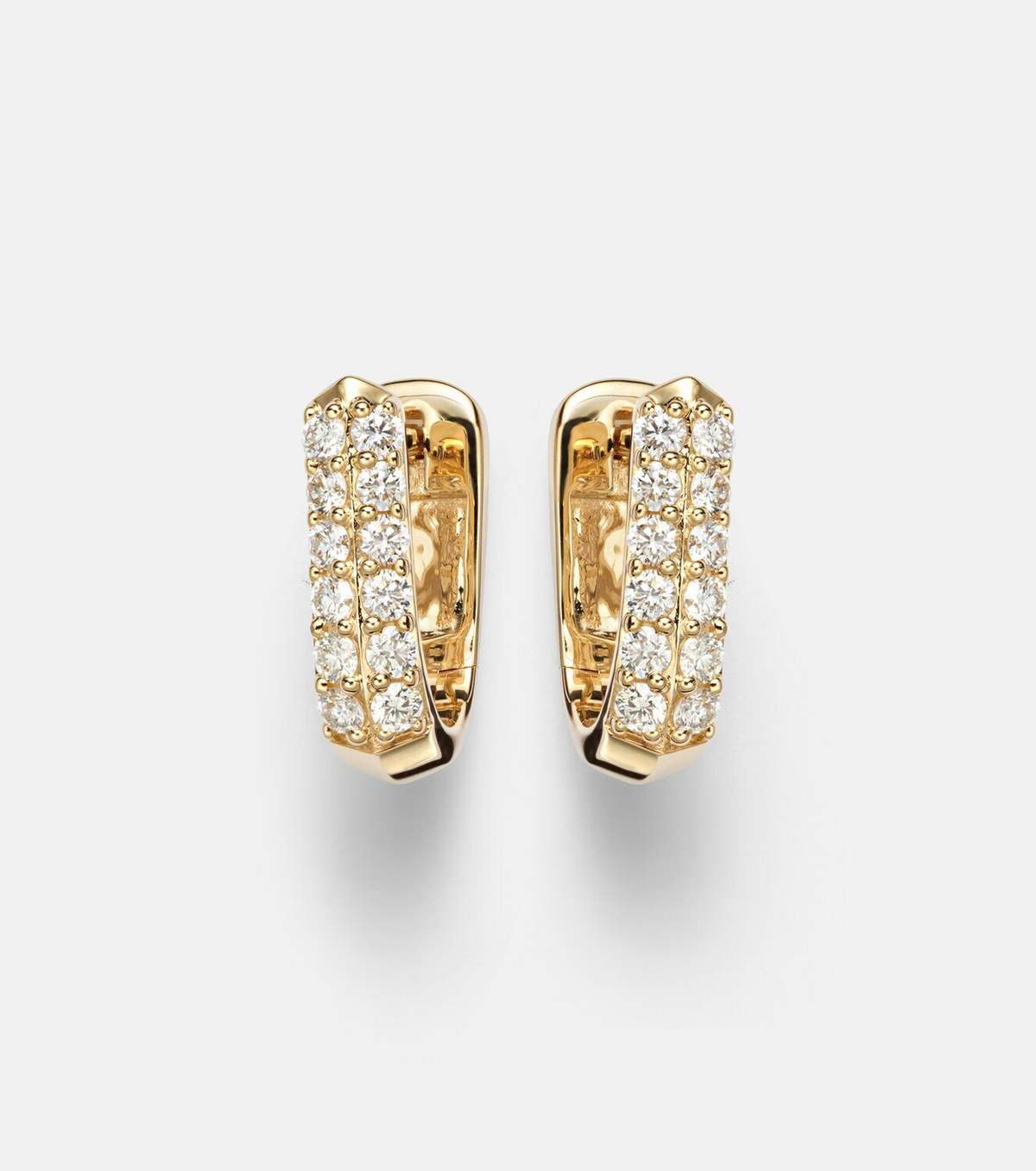 Stone and Strand Knife Edge Wide 14kt gold huggie earrings with diamonds