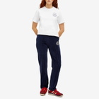 Sporty & Rich Women's NY Crest Velour Track Pants in Navy Cream
