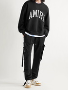 AMIRI - Slim-Fit Tapered Loopback Cotton-Jersey Cargo Sweatpants - Black