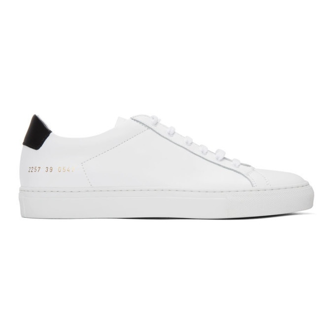 Photo: Common Projects White and Black Retro Sneakers